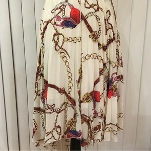 H&M medium length designer, white skirt, pleated